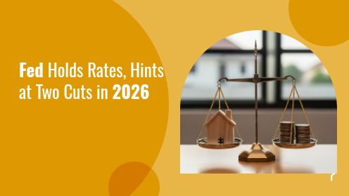 Fed Holds Rates, Hints at Two Cuts in 2026
